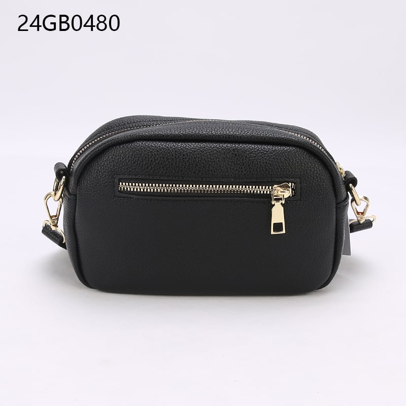 Small faux leather cross body bag with patterned shoulder strap