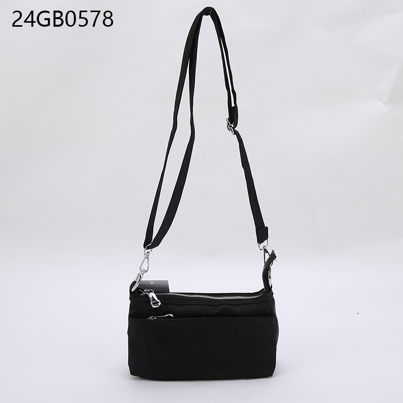 Crossbody bag with multiple pockets and long shoulder strap