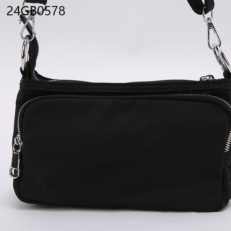 Crossbody bag with multiple pockets and long shoulder strap