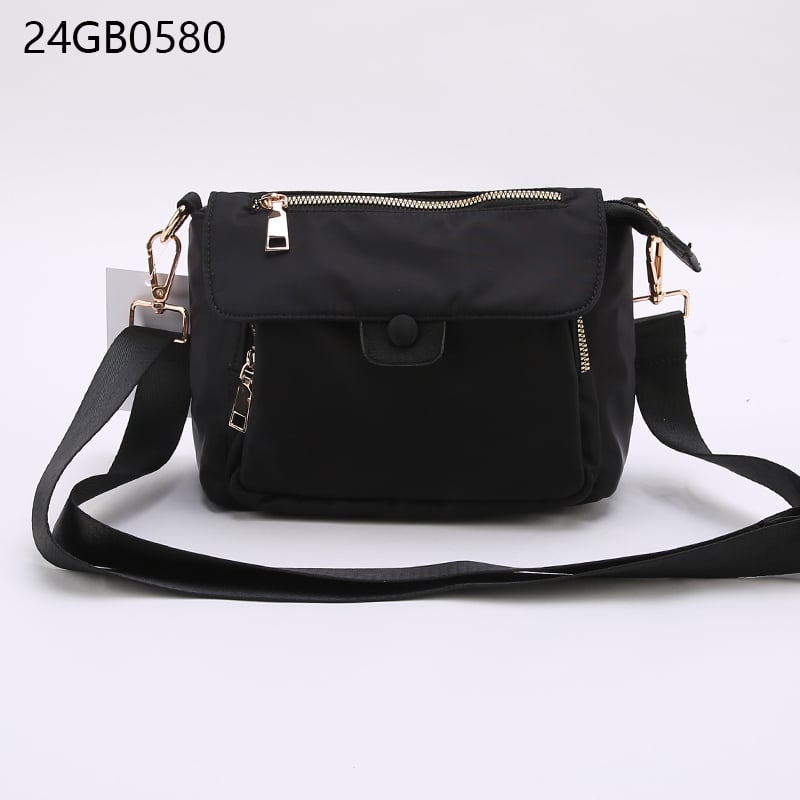 Multi pocket nylon crossbody bag with nylon strap