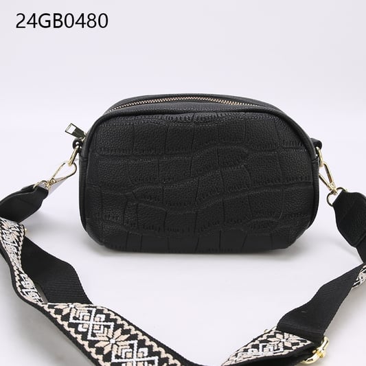 Small faux leather cross body bag with patterned shoulder strap