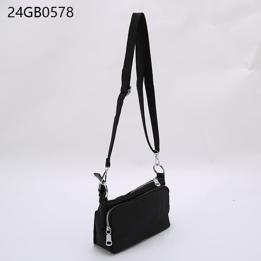 Crossbody bag with multiple pockets and long shoulder strap